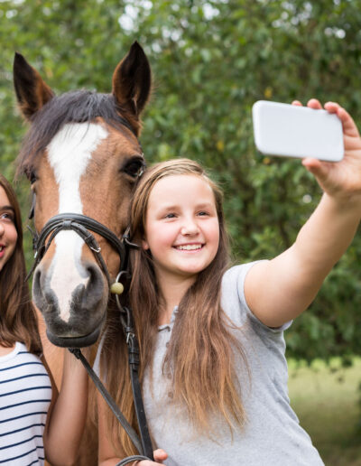 Teenage Girls With Their Pony, taking a selfie in Oldham County, Kentucky